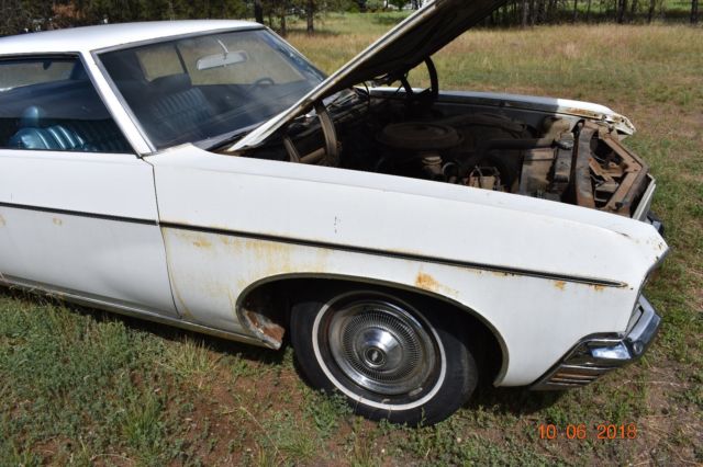 1970 White Chevrolet Impala Coupe