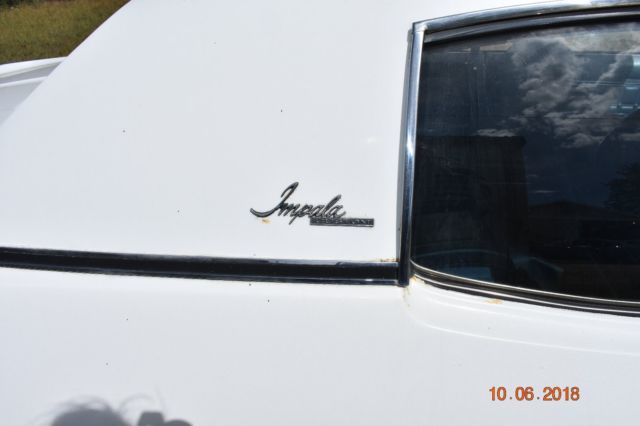 1970 White Chevrolet Impala Coupe