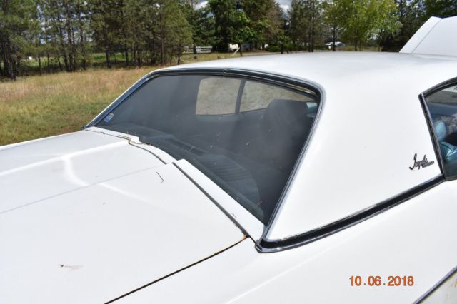 1970 White Chevrolet Impala Coupe