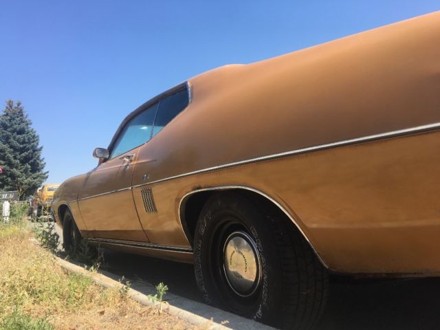 1970 Gold Ford Torino Fastback