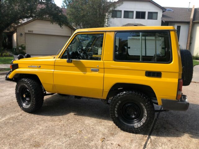 1993 Yellow Toyota Land Cruiser SUV