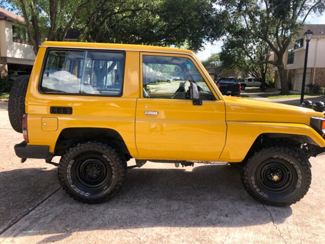1993 Yellow Toyota Land Cruiser SUV