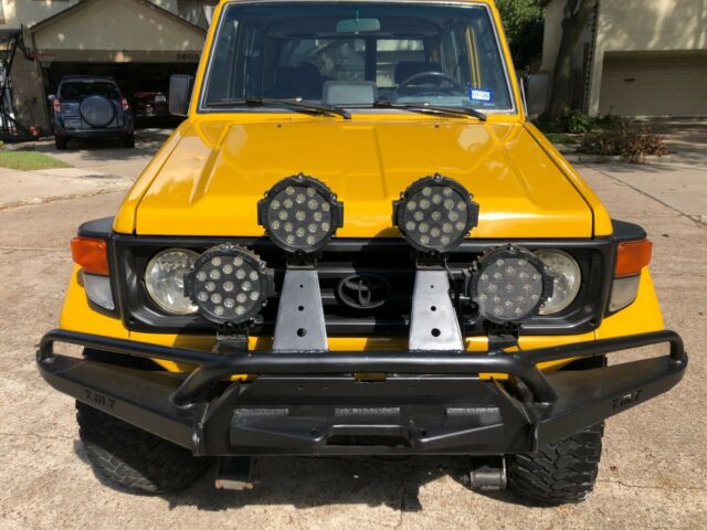 1993 Yellow Toyota Land Cruiser SUV