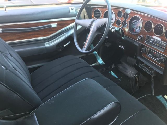 1976 Burgundy Pontiac Grand Prix Coupe