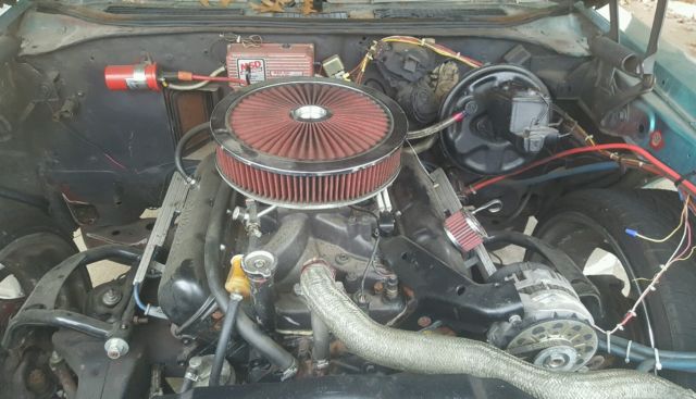 1972 teal green beige stripe Oldsmobile Cutlass Sedan