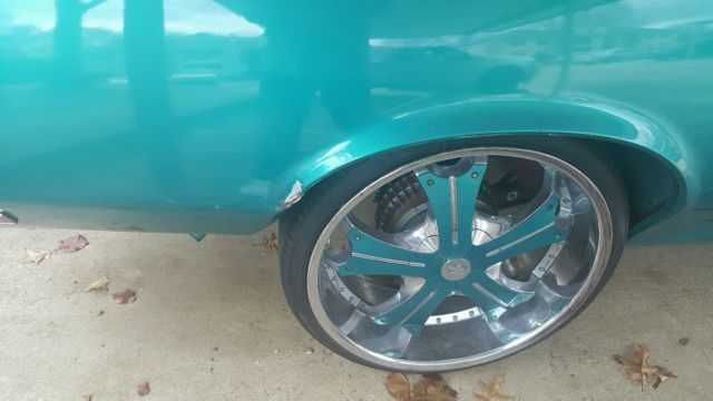 1972 teal green beige stripe Oldsmobile Cutlass Sedan