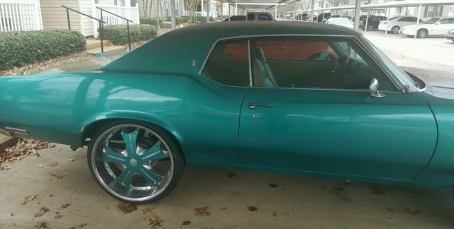 1972 teal green beige stripe Oldsmobile Cutlass Sedan