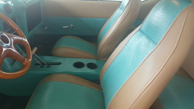1972 teal green beige stripe Oldsmobile Cutlass Sedan