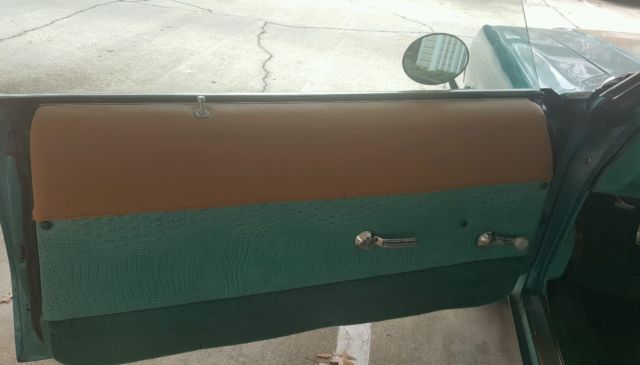 1972 teal green beige stripe Oldsmobile Cutlass Sedan