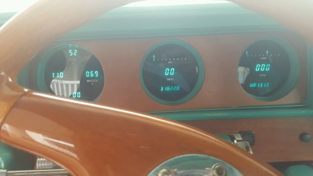 1972 teal green beige stripe Oldsmobile Cutlass Sedan