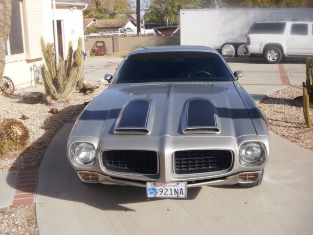1973 argent silver Pontiac Firebird coupe