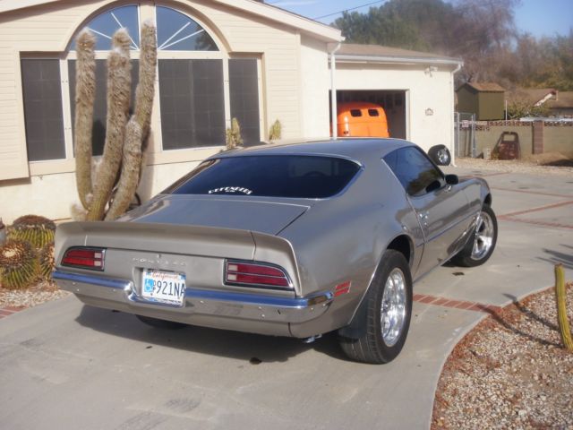 1973 argent silver Pontiac Firebird coupe
