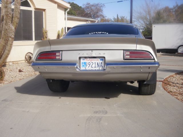 1973 argent silver Pontiac Firebird coupe