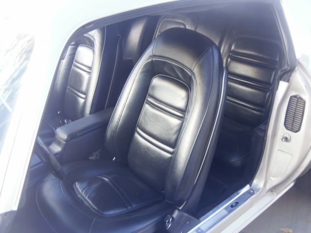 1973 argent silver Pontiac Firebird coupe