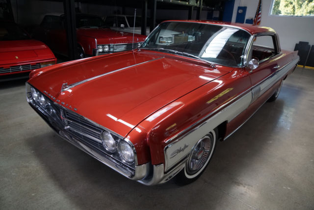 1962 Burgundy Oldsmobile Starfire 2 door Hardtop
