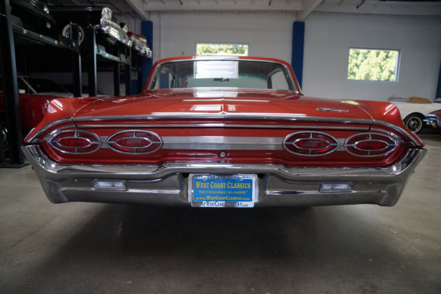 1962 Burgundy Oldsmobile Starfire 2 door Hardtop
