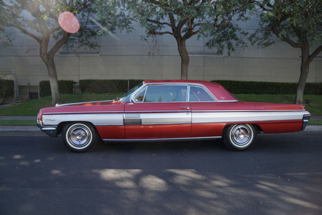 1962 Burgundy Oldsmobile Starfire 2 door Hardtop