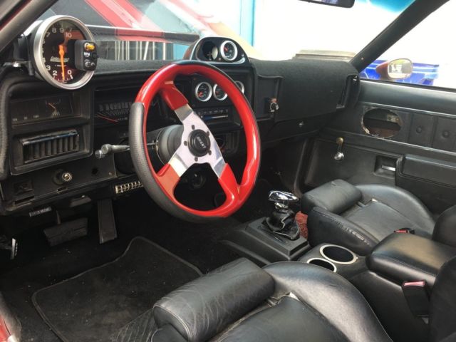 1974 black and red Chevrolet El Camino