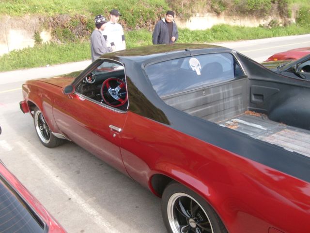 1974 black and red Chevrolet El Camino