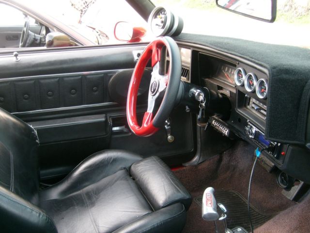 1974 black and red Chevrolet El Camino