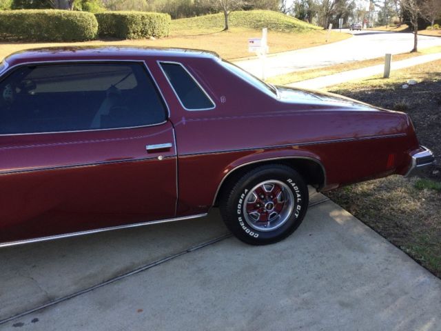1974 Burgundy Oldsmobile Cutlass Coupe
