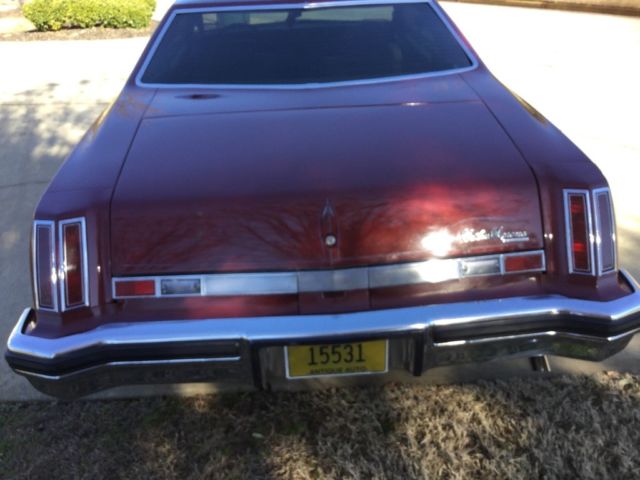 1974 Burgundy Oldsmobile Cutlass Coupe