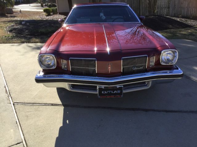 1974 Burgundy Oldsmobile Cutlass Coupe
