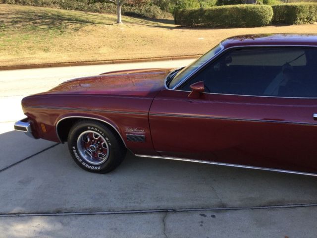 1974 Burgundy Oldsmobile Cutlass Coupe