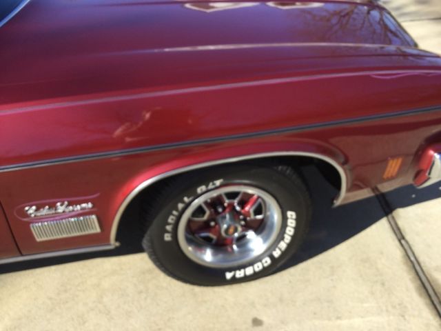 1974 Burgundy Oldsmobile Cutlass Coupe