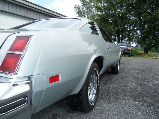 1976 Silver Oldsmobile Cutlass Coupe
