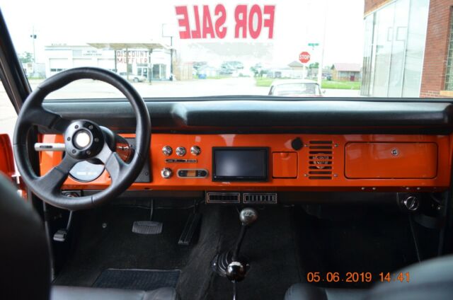 1976 Orange Ford Bronco SUV