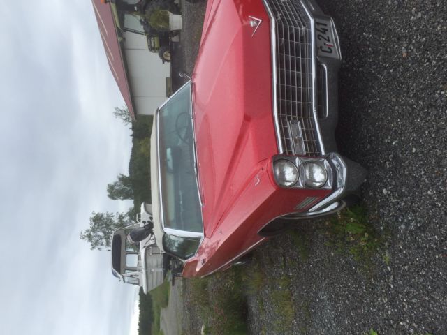 1967 Red Cadillac DeVille Convertible