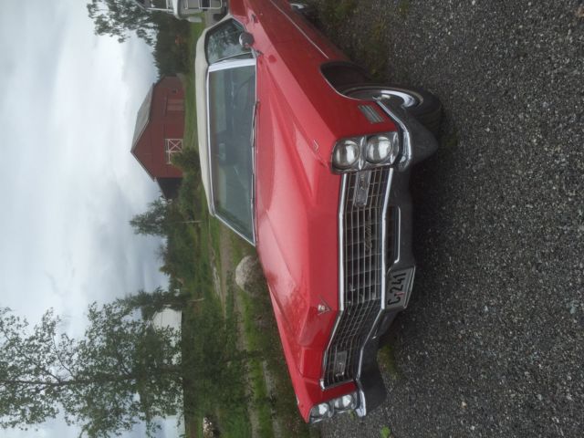 1967 Red Cadillac DeVille Convertible