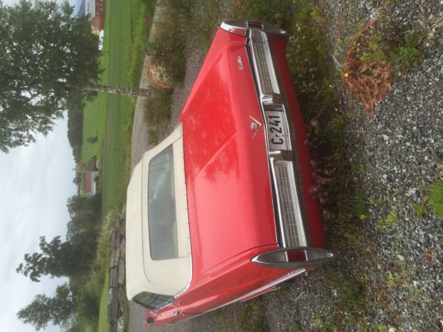 1967 Red Cadillac DeVille Convertible
