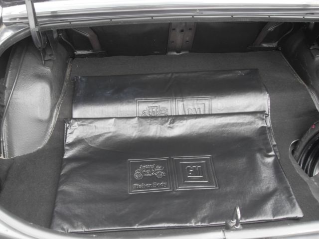 1982 charcoal/ silver Buick Grand National 2 door