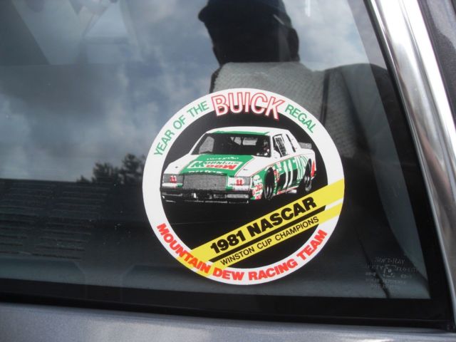 1982 charcoal/ silver Buick Grand National 2 door