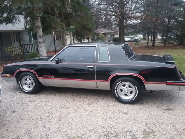 1983 Black Oldsmobile Cutlass Coupe