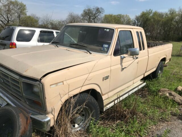 1985 Tan Ford F-250 Extended Cab Pickup