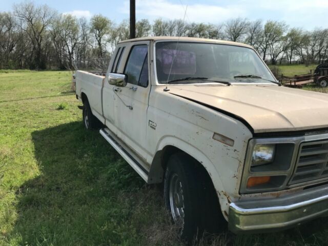 1985 Tan Ford F-250 Extended Cab Pickup