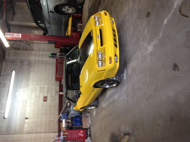 1985 Yellow Ford Mustang Convertible