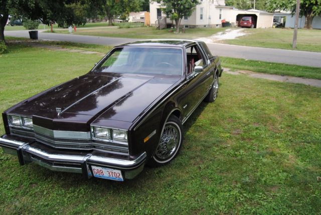 1985 Burgundy Oldsmobile Toronado Coupe
