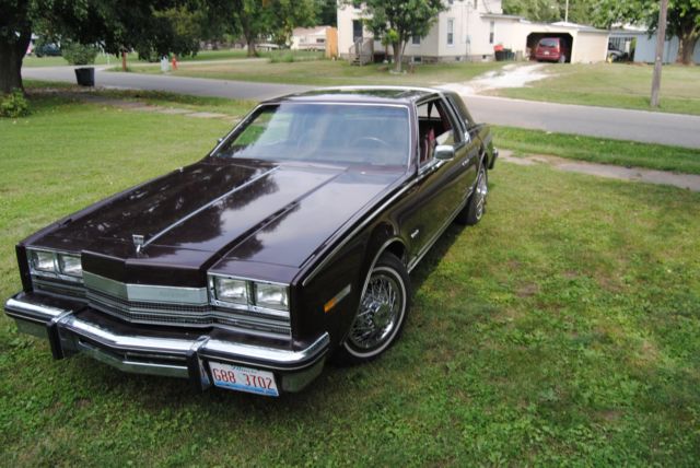 1985 Burgundy Oldsmobile Toronado Coupe