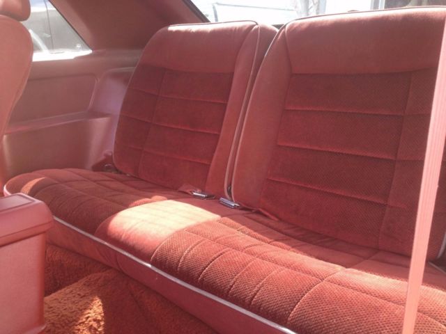 1986 black Ford Mustang Hatchback