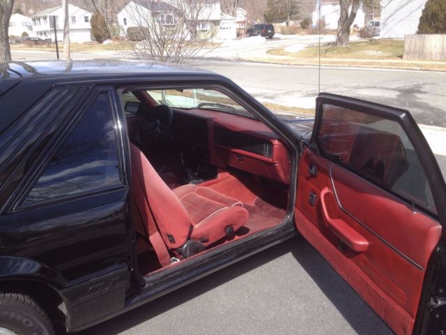 1986 black Ford Mustang Hatchback