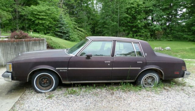1986 Burgundy Oldsmobile Cutlass