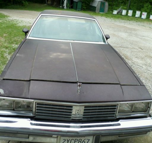 1986 Burgundy Oldsmobile Cutlass