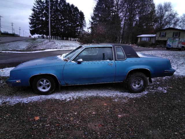 1986 Blue Oldsmobile Cutlass Coupe