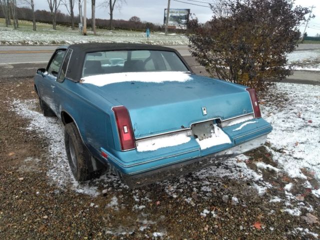 1986 Blue Oldsmobile Cutlass Coupe