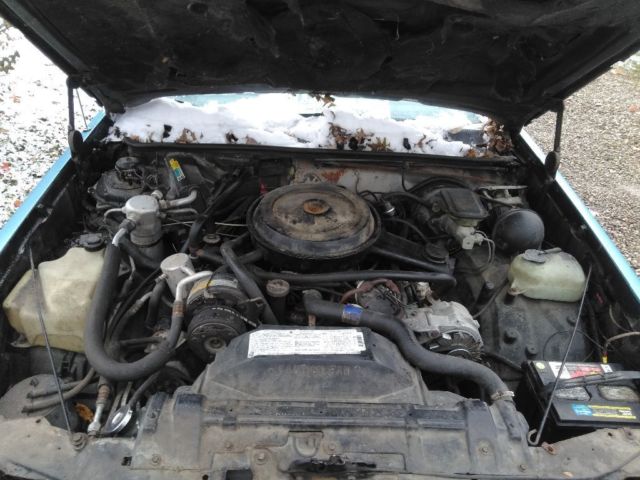 1986 Blue Oldsmobile Cutlass Coupe