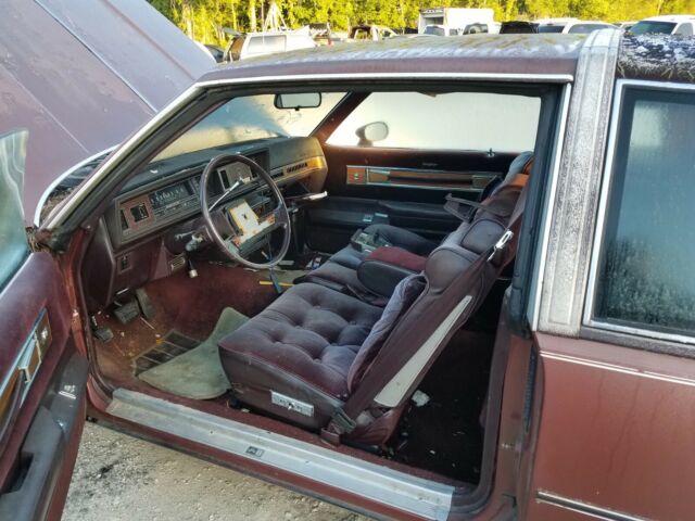 1987 Burgundy Oldsmobile Cutlass Coupe
